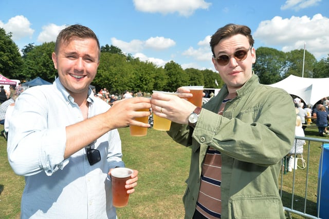 Cheers...Lawrence Thompson and Tom Chudley during the Food and Drink Festival at Welland Park during the Bank Holoday weekend.