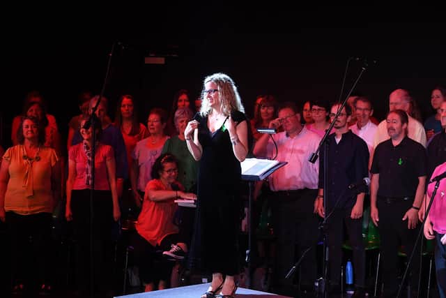 Conductor Tracey Holderness and NSPCC fundraiser with the Great Bowden Recital Trust adult choir and professional singers at Welland Park Academy on Saturday evening.PICTURE: ANDREW CARPENTER