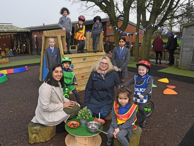 Radha Badhan head teacher and Amanda Biggs Chairman of the PTA join pupils for an al fresco feast. 
PICTURE: ANDREW CARPENTER