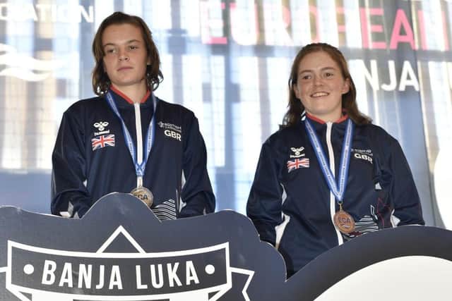 Kerry and Emma Christie on the podium