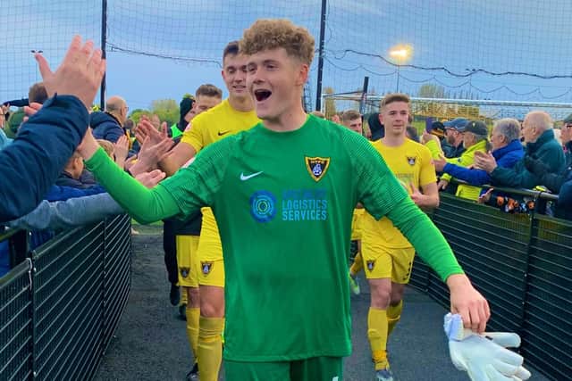 James Dadge was all smiles after his heroics for Harborough Town in the FA Trophy on Saturday (Picture: @HarbTownFC)