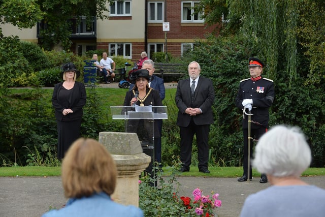 Councllior Rani Mahal vice chairman of Harborough District Council reads the proclamation in the Memorial Gardens.