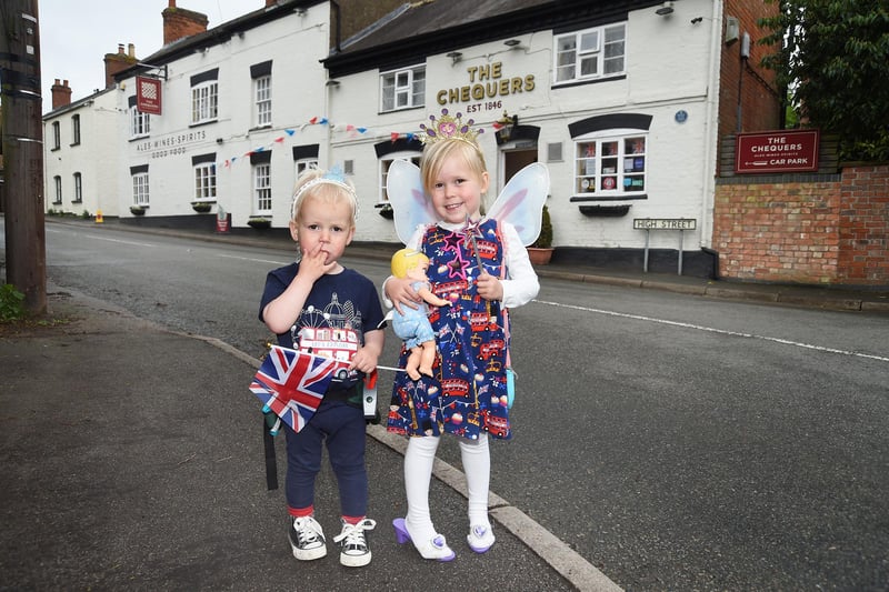 Arthur Neal-Brook, 2, and Maybelle Neal-Brook, 3, head to the Coronation party at the Chequers pub in Swinford.