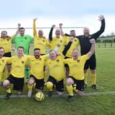 Harborough Town Veterans celebrated winning the Division Six title. Picture by Andrew Carpenter
