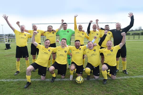 Harborough Town Veterans celebrated winning the Division Six title. Picture by Andrew Carpenter