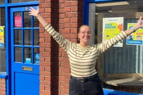 Volunteer outside the new shop. Picture: RSPCA Woodside