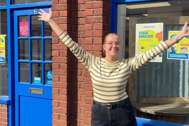 Volunteer outside the new shop. Picture: RSPCA Woodside