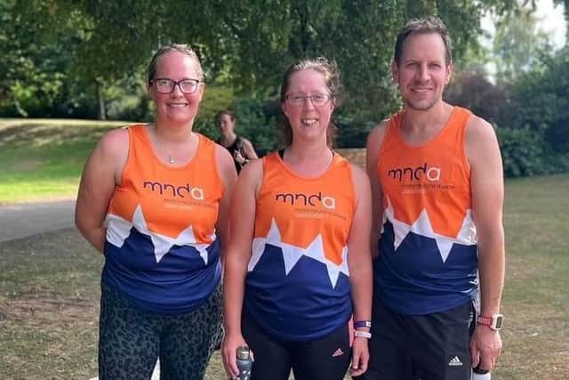 The family trio of Katie Campion, Mary James and Sid Parr completing the 60-mile challenge