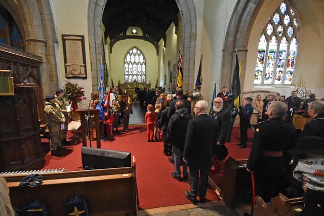 Wreath laying in St Mary's church in Lutterworth.