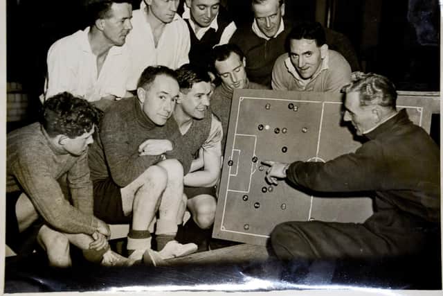 Dai joins his team for a tactics talk. Submitted image.