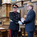 PPE hero Aaron Shrive has been presented with a British Empire Medal after he made over 15,000 pieces of vital kit when the Covid pandemic blew up.