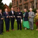 Receiving their Coronation Champion awards - Bob Lee, Robert White, Adam Jones, Lord-Lieutenant Mike Kapur, Helen Crouch, Geoffrey Kirk, Kimberley Durham, Jasu Tailor.