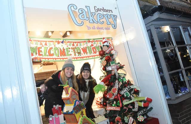 Gardners Cakery with Ella and Leila take 2nd place for Best Dressed Window.