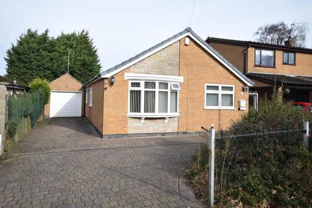 This three-bedroom, detached bungalow at Oakwood Drive in Ravenshead is on the market with estate agents Gascoines for offers in excess of £340,000. Note the extensive driveway and attached garage with electric doors.