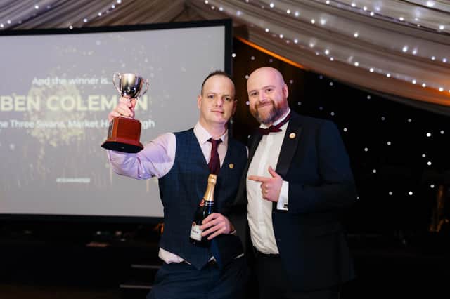Ben is pictured receiving his award from group executive head chef Dave Simms