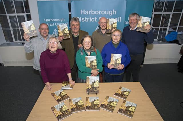 Contributors from left, Michael Hitchcox, Pam Hinett, Dr Len Holden, Rosalind Willatts, David Johnson, Pat Perkins and Peter Liddle during the launch of the Market Harborough Historical Society book held at the Symington Building.
PICTURE: ANDREW CARPENTER