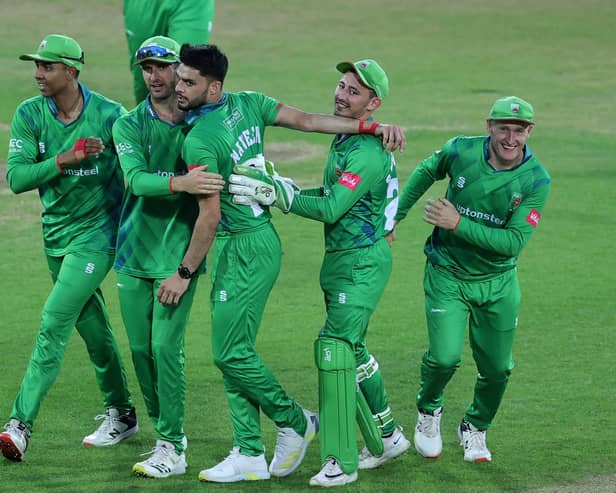 Naveen-ul-Haq of Leicestershire Foxes is mobbed by team mates after taking the wicket of Dane Paterson to win the Vitality T20 Blast match between Nottinghamshire Outlaws and Leicestershire Foxes at Trent Bridge. (Photo by David Rogers/Getty Images)