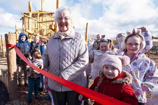 The new playground was opened by Janet Mills and twenty 'play testers'.
