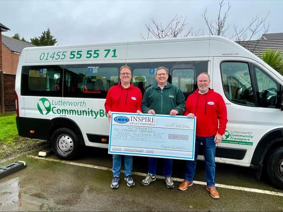 Volunteers Ray Perkins and Jerome Anderton presented the cheque to Lutterworth Community Transport manager Graeme Thomson