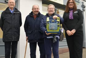 Chair Mike Perks, Mr Ian Staples and Mrs Sue Staples all from the Masharani Patient Group and Lutterworth assistant branch manager Jo Rogers.