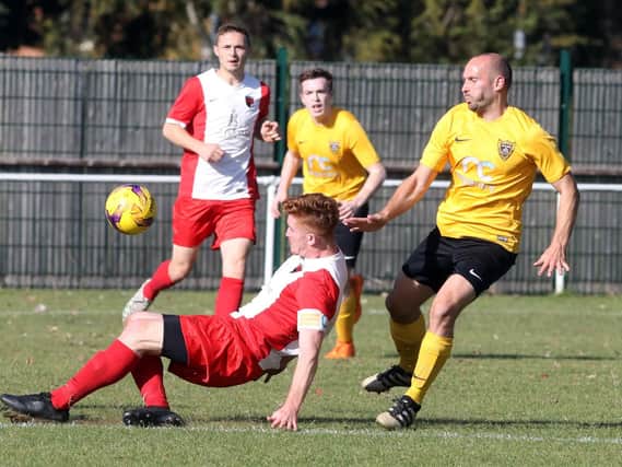 Action from Harborough Town's loss to Whitworth