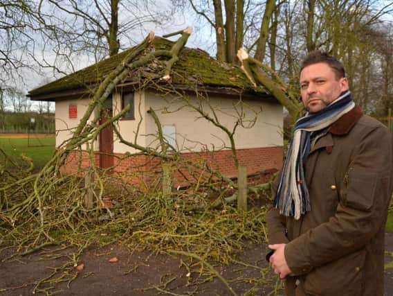 Adam Shepherd chairman of Great Bowden parish council besides the toilet block after the storm damage at Great Bowden cricket ground. PICTURE: ANDREW CARPENTER