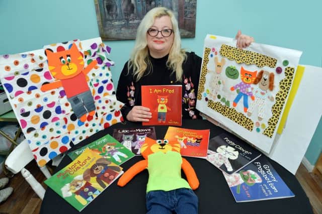Nicola Rolfe, mum to a transgender daughter aged 13, who has been living as her true self for over a year.
She has written and illustrated a series of seven kids books called Rainbow Street, which have lots of diverse characters including transgender.
PICTURE: ANDREW CARPENTER NNL-180123-103617005