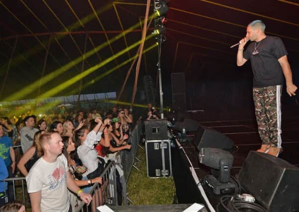 Example and DJ Wire on stage 1 during Texfest.
PICTURE: ANDREW CARPENTER NNL-180207-105657005