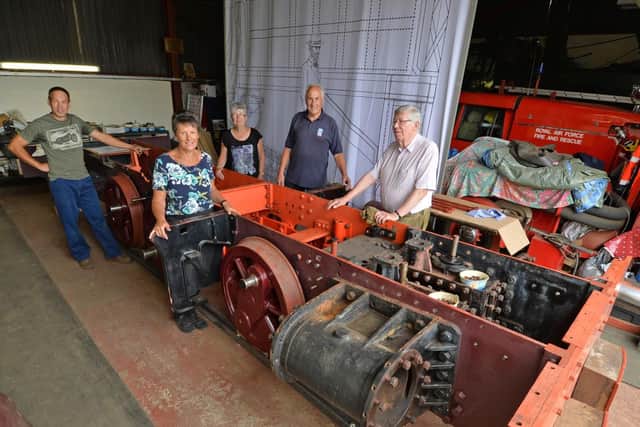 Ian Morris, Mandy Hudson, Janet Locke, John Locke and Roger West with the Kettering Furnances No8 steam engine which they hope to rebuild in the next couple of years. PICTURE: ANDREW CARPENTER