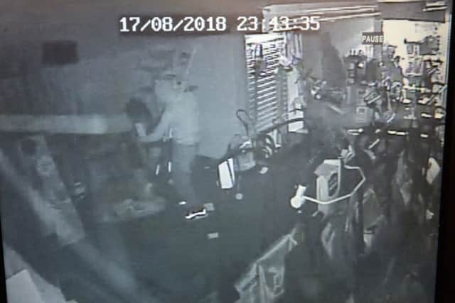 CCTV footage of the thieves stealing equipment. NNL-180819-124532005
