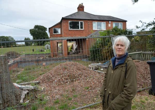 Susan Bird has been living next door to this bomb site for over six years in Burton Overy.
PICTURE: ANDREW CARPENTER NNL-180828-102648005