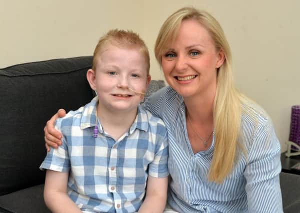 Katie Freestone and son Jay recovering at home after his incredible five transplant operations.
PICTURE: ANDREW CARPENTER NNL-180409-103346005