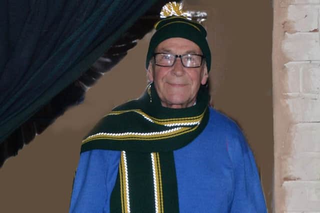 Paul Hall wearing one of the reflective school scarf and hat.
PICTURE: ANDREW CARPENTER NNL-180509-082504005