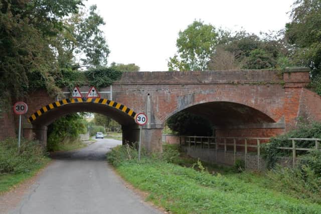 The railway bridge on Rushes Lane in Lubenham with two archways and two levels of road.
PICTURE: ANDREW CARPENTER NNL-181109-164858005