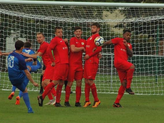 Callum Riley scored this fine free-kick but could not stop Lutterworth Athletic losing a Melton Town last weekend