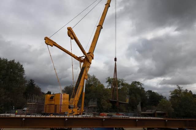Bridge parts being lifted into place. Photo: Breheny Civil Engineering.
