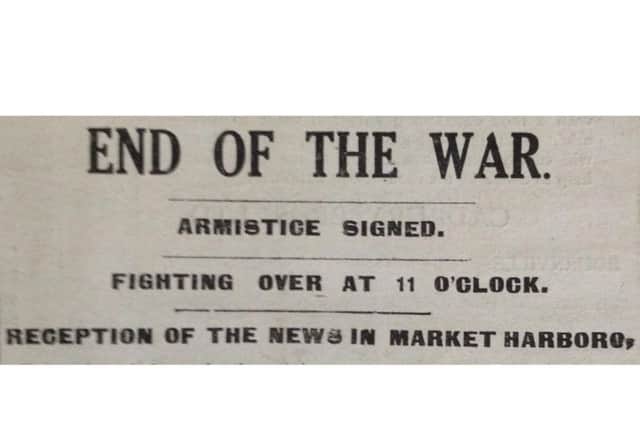 The headline in the paper announcing the armistice of 1918