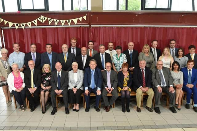 Harborough District Councillors face the camera before the Council meeting at Harborough Indoor Market.PICTURE: ANDREW CARPENTER