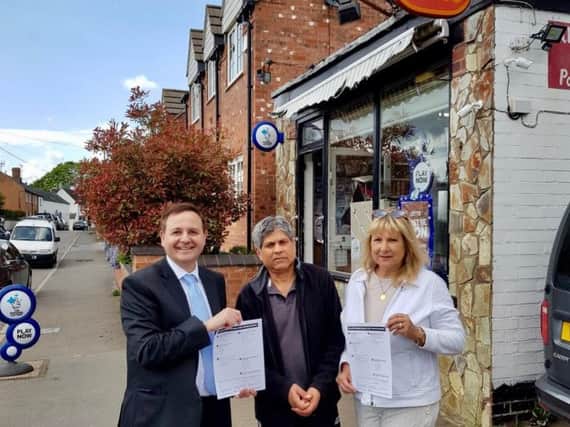 Alberto Costa MP with Nav Vara, postmaster of the Ullesthorpe Post Office and Cllr Rosita Page outside the Post Office in Ullesthorpe.