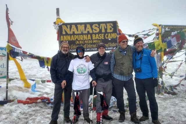 The trekkers at the Annapurna Base Camp with Charles in the white t-shirt
