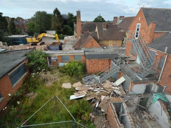 Work has started on demolishing the old Cottage Hospital on Coventry Road in Market Harborough. PICTURE: ANDREW CARPENTER