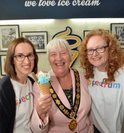 Harborough District chairman Barbara Johnson with Joy Hanlon and Emma Page of Spectrum during the event at Gallones.
PICTURE: ANDREW CARPENTER