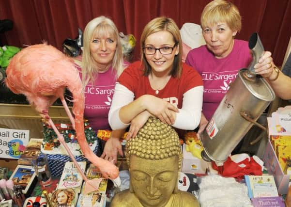Myra Keatley-Lill, Rachel Keatley-Lill and Pauline Reynolds during a previous Clic Sargent indoor car boot at the Wycliffe Rooms in Lutterworth