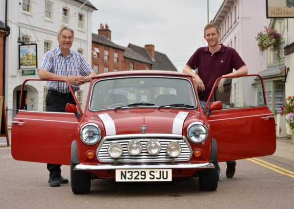 Mervyn and Adam Jones, of Lutterworth, getting ready to drive from Dover to Turin for the Italian Job Mini-run in aid of St Mary's Church in Potters Marston.
 (Picture by: Andrew Carpenter)