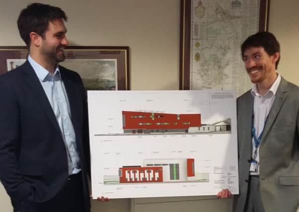 One of the elevations held by the St Luke's project team (from left to right) Alex Statham (project manager of Faithful & Gould) and Mark Croft (project manager of NHS Property Services.)