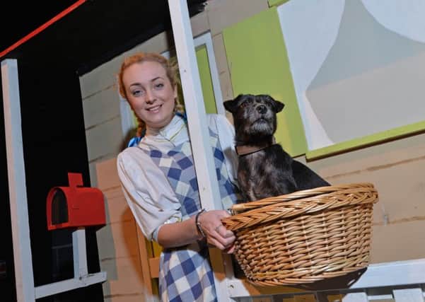 Ashley Cook who plays Dorothy and Shadow as Toto of The Youth Theatre in Market Harborough during rehearsals of The Wizard of Oz.
PICTURE: ANDREW CARPENTER NNL-160119-101756001