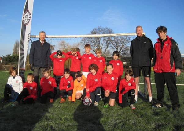 Borough Alliance Juniors under 11s team is celebrating after receiving a stylish new set of threads thanks to Harborough's McDonald's restaurant