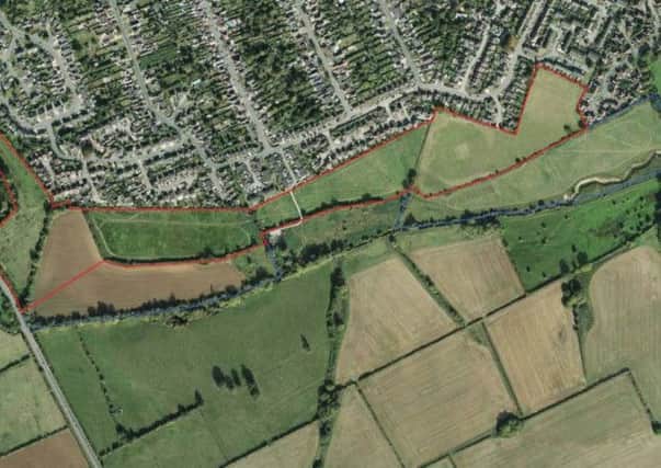 The red lines on this aerial shot show the proposed development site boundary.