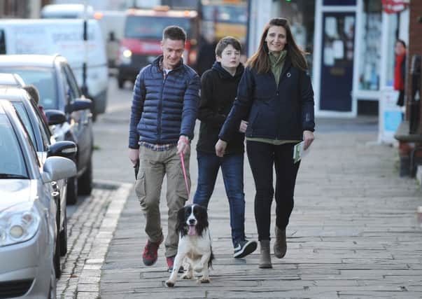 Bella back on the streets in Rothwell with Phil Osborne, Joseph Luckman, 13, and Sarah Osborne