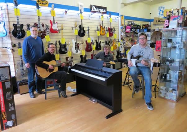 Matt Hankins, of MH Music, with some of the Learn to Play tutors - Martyn Storey, Tim Blackman and Dave Gardiner